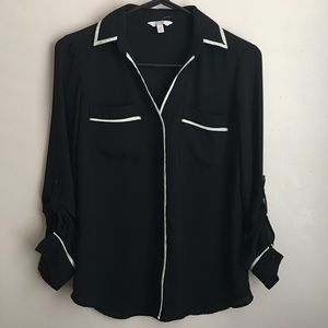 Candice’s black blouse